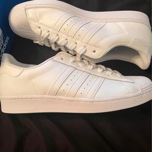 Brand new white Adidas classics.